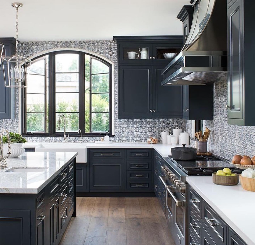 custom Modern Aire range hood helping remove cooking odors from kitchen.