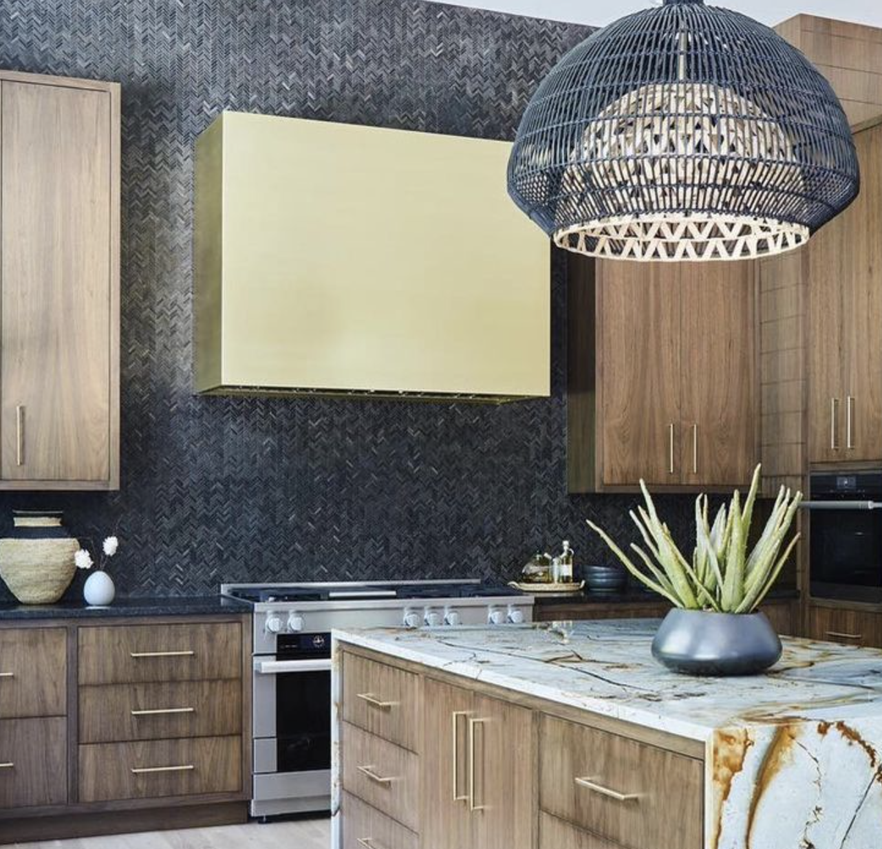 custom kitchen ventilation integrated with cabinetry and kitchen finishes.