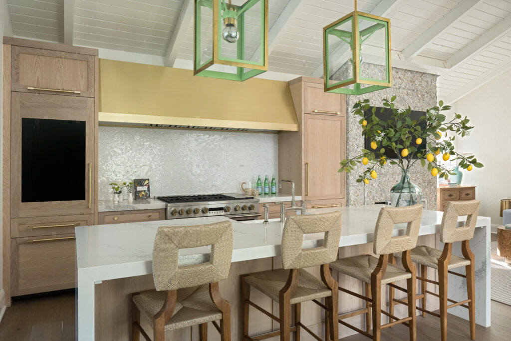 range hood capture area extending over cooking surface for smoke and grease removal