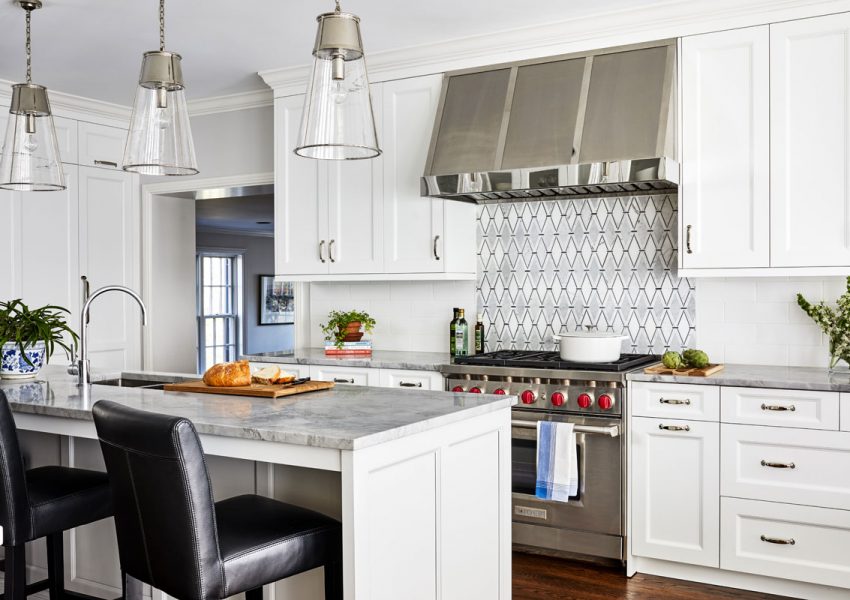 custom kitchen with properly planned range hood ventilation.